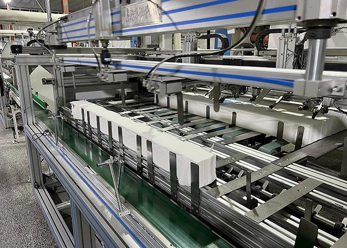 Paper product converting and packing equipment for OEM production